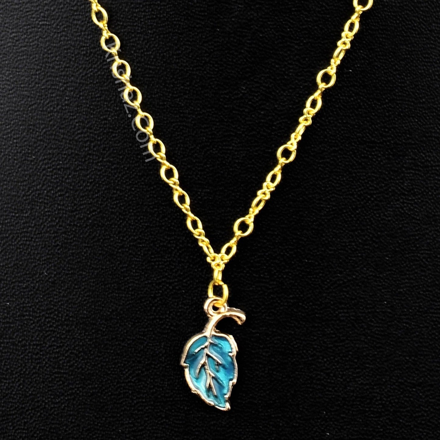 Gold Figure 8 Chain with Leaf charms