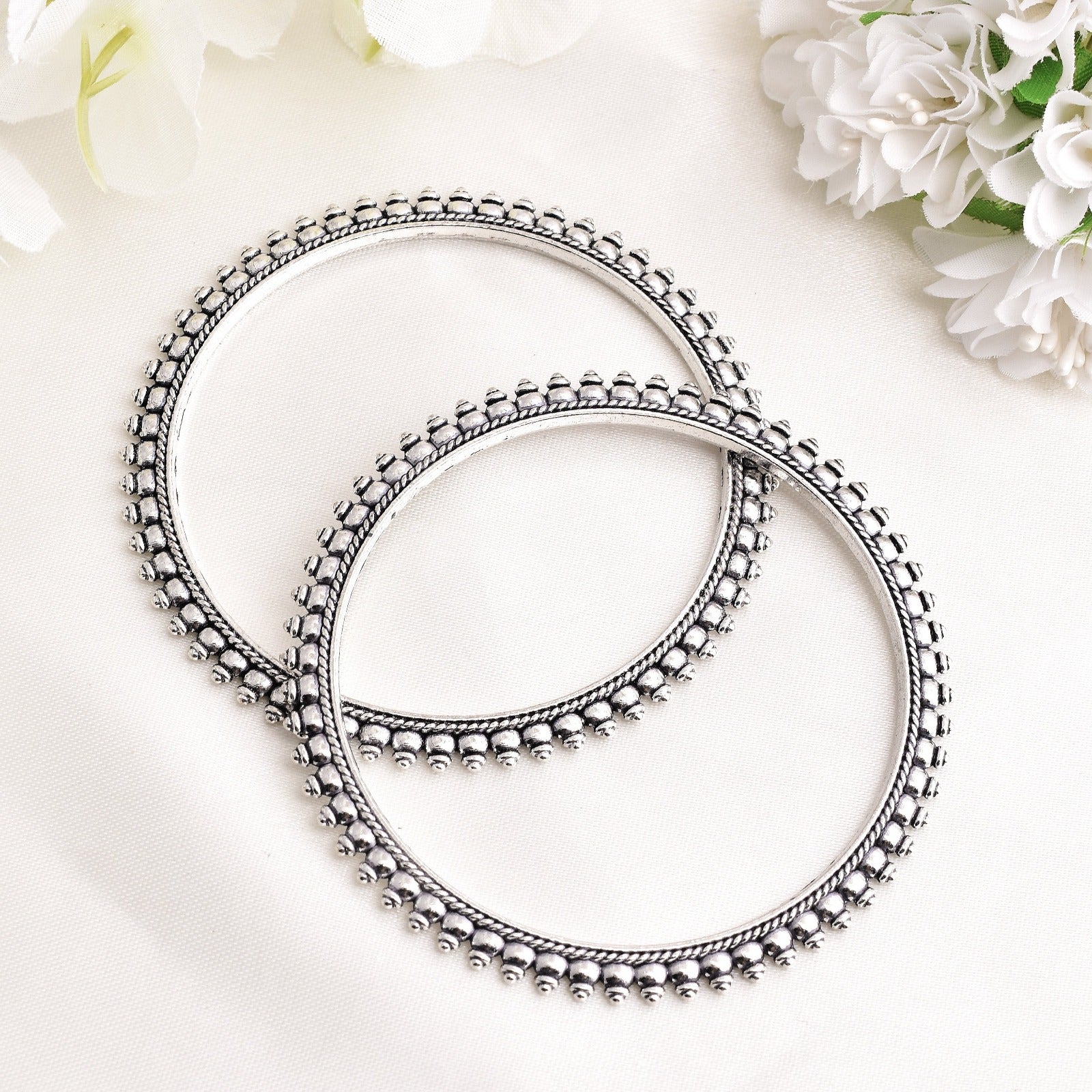 A Pair of Kolhapuri Style German Silver Kada Bangle - Krishaz