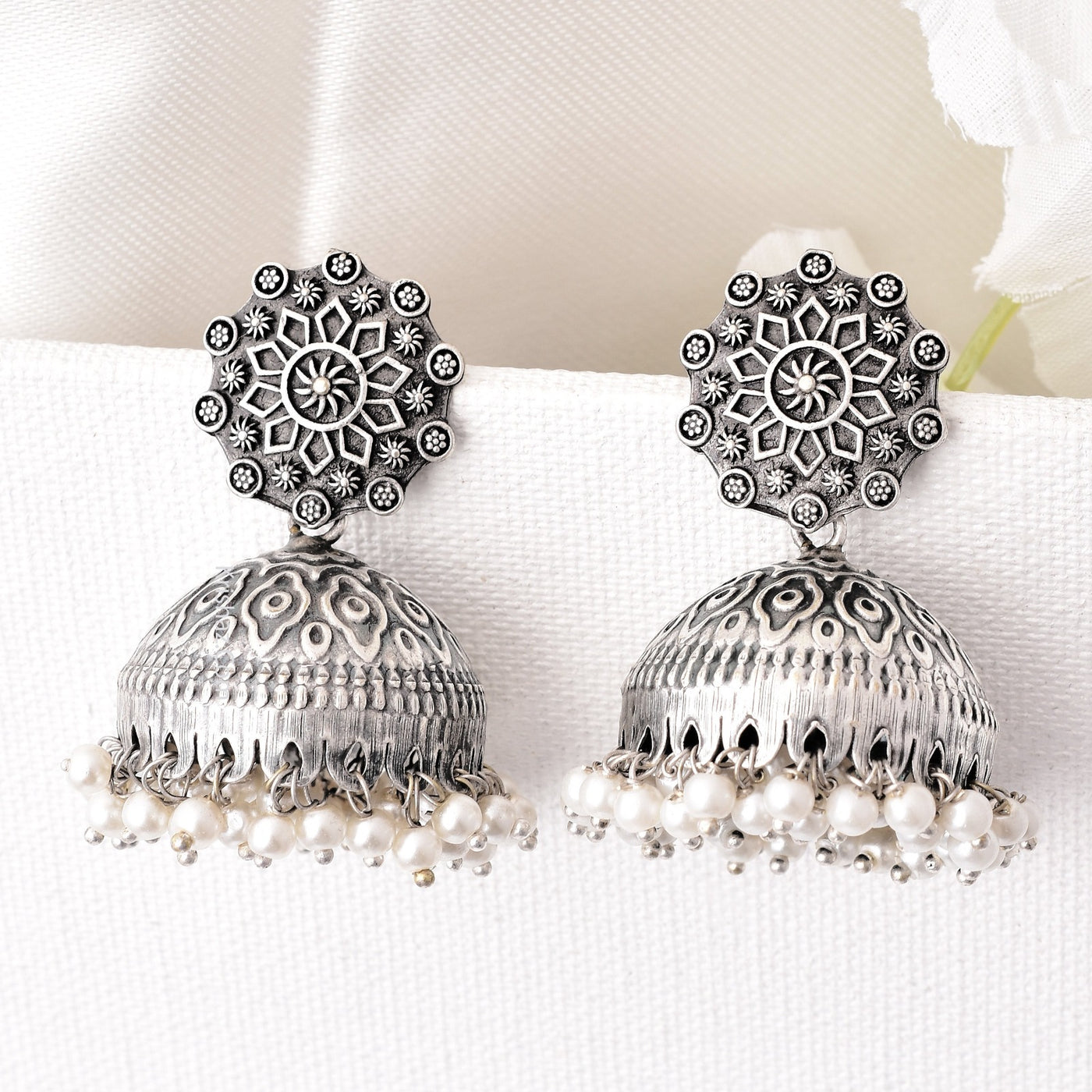 Ileana Flower Design Silver Look Alike Jhumka Earrings