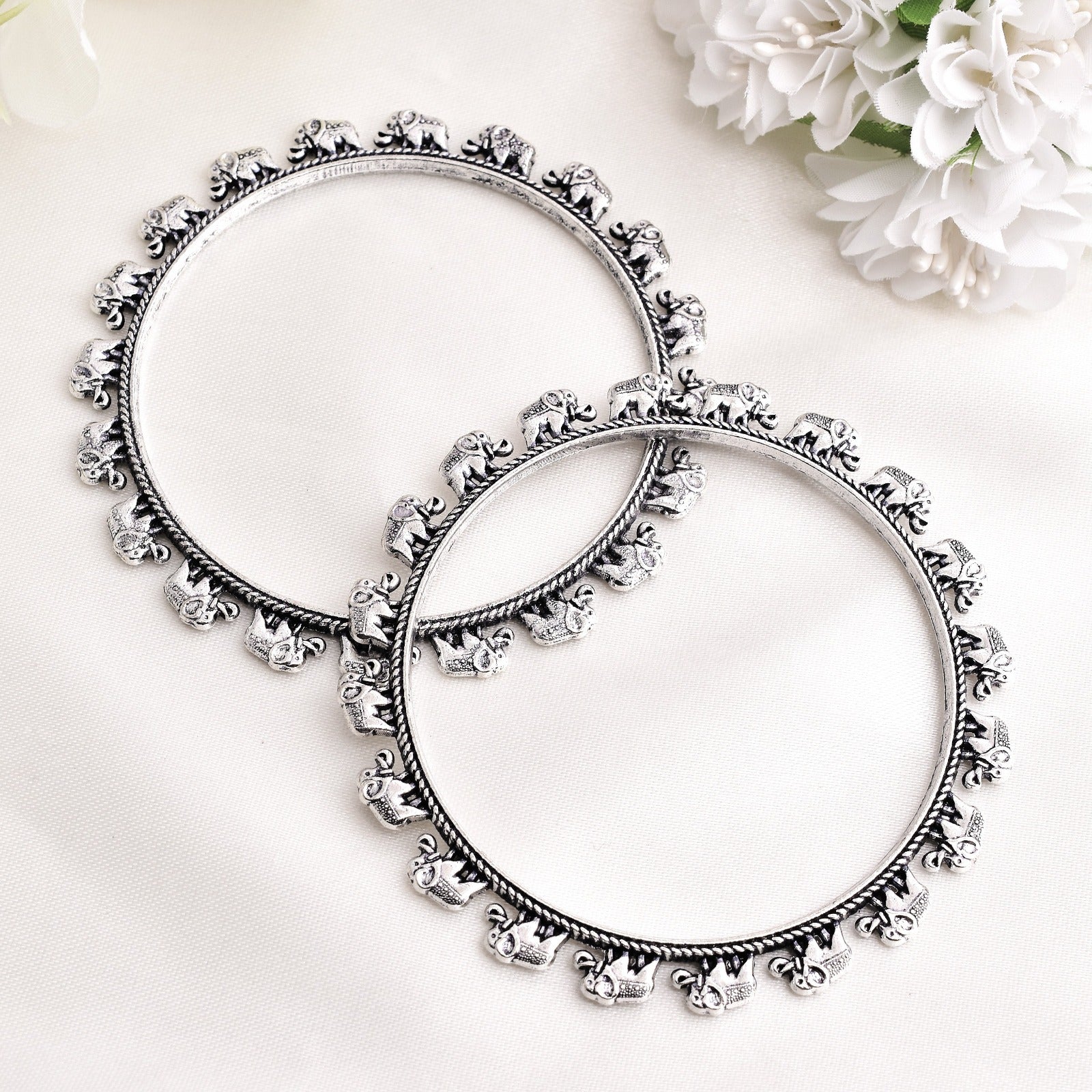 A Pair of Elephant Designed Kolhapuri Style German Silver Kada Bangle - Krishaz